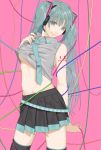  1girl cable green_eyes green_hair hatsune_miku headset highres kosagi_midori long_hair navel necktie pink_background skirt smile solo thigh-highs twintails vocaloid 