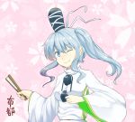  00zumou 1girl blue_eyes breasts closed_fan fan folding_fan hat holding japanese_clothes kariginu long_hair long_sleeves looking_at_viewer mononobe_no_futo pink_background ponytail ribbon silver_hair simple_background smile solo tate_eboshi touhou wide_sleeves wink 