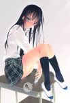  1girl black_hair blue_eyes bra cellphone highres knees_up legs long_sleeves murakami_suigun phone plaid plaid_skirt school_uniform see-through sitting_on_desk skirt smartphone socks tagme underwear wet wet_clothes wet_shirt white_bra 