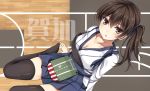  1girl black_legwear breasts brown_eyes brown_hair cleavage flight_deck hakama_skirt japanese_clothes kaga_(kantai_collection) kaguyuu kantai_collection muneate no_shoes open_mouth personification short_hair side_ponytail solo tasuki thighhighs 