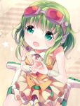  1girl :d bad_id goggles goggles_on_head green_eyes green_hair gumi headset looking_at_viewer open_mouth opopowa sitting smile vocaloid wariza 