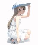  1girl blush brown_hair dress getsumen hat highres long_hair looking_at_viewer love_live!_school_idol_project minami_kotori sandals simple_background smile solo squatting white_background white_dress yellow_eyes 