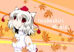  1girl animal_ears autumn_leaves bare_shoulders blush character_name detached_sleeves hat inubashiri_momiji leaf leaf_background looking_at_viewer open_mouth pom_pom_(clothes) red_eyes short_hair silver_hair solo touhou wolf_ears 