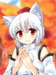 1girl animal_ears bare_shoulders blush detached_sleeves hainakku hat inubashiri_momiji leaf looking_at_viewer nature pom_pom_(clothes) red_eyes short_hair silver_hair smile solo steepled_fingers touhou tree wolf_ears 