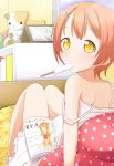  1girl :&lt; back bare_shoulders bed blush book brown_hair dress dripping hair_ornament hairclip highres hoshizora_rin looking_at_viewer looking_back love_live!_school_idol_project makuran mouth_hold official_art pillow popsicle sexually_suggestive sitting sitting_on_bed sleeveless sleeveless_dress solo stuffed_animal stuffed_cat stuffed_toy sundress white_dress yellow_eyes 