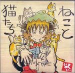  1girl animal_ears animal_on_head brown_hair cat cat_ears cat_on_head cat_tail chen hat looking_at_viewer short_hair simple_background smile tail touhou translation_request yotsuboshi-imai 