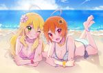  2girls beach bikini blonde_hair blush breasts brown_hair cleavage flower green_eyes hair_flower hair_ornament idolmaster long_hair looking_at_viewer lying multiple_girls on_stomach one_eye_closed open_mouth red_eyes sand short_hair smile striped striped_swimsuit swimsuit water wink 