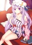  1girl absurdres blush book bow breasts couch crescent hat highres large_breasts long_hair patchouli_knowledge pillow purple_hair sitting solo touhou 