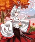  1girl animal_ears autumn_leaves bare_shoulders blush blush_stickers breasts detached_sleeves hat highres inubashiri_momiji leaf looking_at_viewer mountain nature nayutaro pom_pom_(clothes) red_eyes short_hair silver_hair solo tail tokin_hat touhou tree wolf_ears wolf_tail 