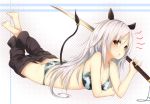  1girl animal_ears barefoot bikini brown_eyes cow_ears cow_tail holding katana la-na long_hair looking_at_viewer lying on_stomach original silver_hair solo swimsuit sword tail weapon 