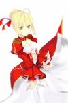 1girl ahoge blonde_hair blurry depth_of_field dress fate/extra fate_(series) green_eyes highres red_dress saber_extra solo yuusha_(hsq547547) 