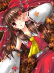  bad_id black_hair bow brown_hair detached_sleeves frills hair_bow hakurei_reimu kamiya_chiaki large_bow leaf long_hair maple_leaf on_back open_mouth outdoors outside red_eyes short_hair solo touhou wink 