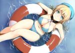  1girl atago_(kantai_collection) bare_shoulders bikini blonde_hair blush breasts cleavage floating hat highres innertube kamata_yuuya kantai_collection large_breasts long_hair looking_at_viewer navel revision side-tie_bikini smile solo swimsuit 