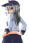  1girl ass blue_eyes hat hibiki_(kantai_collection) highres kantai_collection long_hair long_sleeves nishi_koutarou sailor_hat school_uniform serafuku shirt silver_hair simple_background skirt skirt_pull solo undressing white_background 