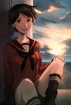  1girl black_hair clouds grey_eyes kantai_collection mogami_(kantai_collection) open_mouth school_uniform serafuku short_hair shorts sitting smile solo sunlight sunset water 