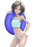 1girl ahoge bare_shoulders bikini_bottom black_hair blue_eyes collarbone hand_on_hip heart highres idolmaster innertube jewelry kikuchi_makoto looking_at_viewer necklace parted_lips short_hair simple_background solo standing striped striped_swimsuit swimsuit tan tanline tsukiyo_umi white_background wristband 