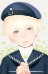  1girl blonde_hair blue_eyes bust clothes_writing clover four-leaf_clover hands_together hat holding kantai_collection kodama_(wa-ka-me) lips looking_at_viewer neckerchief realistic sailor_collar sailor_hat short_hair solo z1_leberecht_maass_(kantai_collection) 