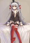  1girl absurdres amatsukaze_(kantai_collection) bed brown_eyes choker fuuko_chan garter_straps hair_tubes hairband highres kantai_collection long_hair looking_at_viewer no_shoes red_legwear school_uniform serafuku silver_hair sitting small_breasts solo striped striped_legwear two_side_up 