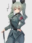  1girl anchovy blush cowboy_shot drill_hair girls_und_panzer green_hair hair_ribbon hand_on_hip highres long_hair looking_at_viewer military military_uniform pants red_eyes ribbon riding_crop solo sumisu_(mondo) sweatdrop twin_drills twintails uniform 