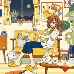  1girl :d absurdres blue_pants brown_eyes brown_hair butterfree capri_pants coffee_table commentary_request couch cup curtains cushion happy highres holding holding_cushion holding_phone indoors long_hair makeup_brush moon mug nidoran nidoran_(female) night oddish official_art open_mouth pants phone pikachu plant pokemon potted_plant seel sitting slippers smile table teeth themed_object upper_teeth_only window yellow_footwear 