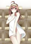  1girl ahoge bare_shoulders blurry blush brown_eyes brown_hair collarbone covering covering_crotch cowboy_shot depth_of_field headgear highres indoors jitei kantai_collection kongou_(kantai_collection) light_smile long_hair looking_at_viewer naked_towel shelf solo towel 