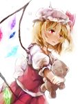 1girl blonde_hair blouse bow cowboy_shot crossed_arms crying flandre_scarlet hat hat_bow highres holding kanekiru mob_cap nail_polish open_mouth puffy_sleeves red_eyes short_hair simple_background skirt skirt_set solo stuffed_animal stuffed_toy tears teddy_bear touhou vest white_background wings x_x 