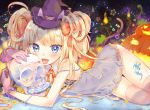  1girl :d animal_ears ass blonde_hair blue_eyes bow candy cat_ears cat_tail dress hair_bow hair_ribbon halloween hat lollipop long_hair looking_at_viewer lying on_side open_mouth original ribbon skull smile solo tail touyama_soboro witch_hat 