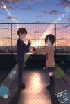  1boy 1girl black_hair blush fence highres looking_at_another looking_away original outstretched_arms rooftop short_hair sunset taka_(tsmix) valentine 
