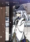  1girl blush grey_eyes hands_in_sleeves hat looking_at_viewer matsuyama_nozomu mononobe_no_futo robe shrine silver_hair sleeves_past_wrists smile snowing solo tate_eboshi touhou wide_sleeves 