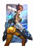  1girl ass breasts brown_eyes brown_hair gauntlets gloves goggles grin highres jacket lena_oxton looking_at_viewer looking_back nudtawut_thongmai overwatch short_hair smile solo torn_clothes tracer_(overwatch) 