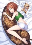  1girl ass barefoot blush body_pillow brown_eyes brown_hair girls_und_panzer looking_at_viewer nishizumi_miho one_eye_closed open_mouth short_hair short_shorts shorts solo stuffed_animal stuffed_toy tank_top teddy_bear 