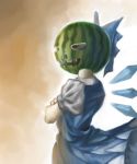  1girl blue_dress bow cirno commentary crossed_arms dress food fruit hair_bow halloween halloween_costume ice ice_wings jack-o&#039;-lantern jack-o&#039;-lantern_(cosplay) melon nagayo puffy_short_sleeves puffy_sleeves shirt short_sleeves solo touhou wings 