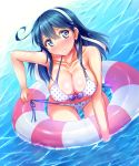  1girl bikini blue_eyes blue_hair blush breasts cleavage collarbone hair_ribbon highres innertube kantai_collection large_breasts long_hair polka_dot polka_dot_bikini polka_dot_swimsuit ribbon side-tie_bikini solo stir255 swimsuit untying ushio_(kantai_collection) water wet 