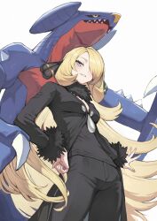  1girl black_pants black_shirt blonde_hair commentary_request cynthia_(pokemon) furry garchomp grey_eyes hand_on_own_hip highres long_hair pants pokemon pokemon_(creature) shirt simple_background torisanff14 white_background 