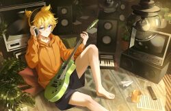  1boy absurdres aqua_eyes bare_legs barefoot bass_guitar black_shorts blonde_hair closed_mouth commentary controller cup feet glass headphones highres holding holding_bass_guitar holding_instrument hood hoodie instrument kagamine_len keyboard_(instrument) looking_at_viewer male_focus nol_bk orange_hoodie paper_airplane remote_control short_hair shorts solo speaker television toes untranslatable_commentary vocaloid 