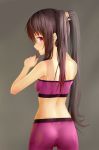  1girl adjusting_hair aki99 ass bare_shoulders brown_hair cowboy_shot from_behind grey_background highres long_hair looking_back midriff mouth_hold original red_eyes solo sports_bra twintails 