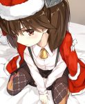  1girl amagai_tarou argyle argyle_legwear bell brown_eyes brown_hair hat kantai_collection looking_at_viewer pantyhose ryuujou_(kantai_collection) santa_costume santa_hat short_hair sitting solo twintails v_arms wariza 