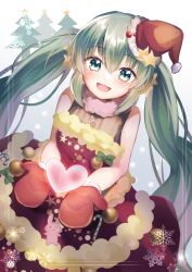  1girl :d alternate_costume blush christmas commentary_request dress fur-trimmed_dress fur_trim gradient_background green_eyes green_hair grey_background hair_between_eyes hat hatsune_miku heart highres long_hair looking_at_viewer mani_(manidrawings) mittens red_dress red_mittens santa_hat sidelocks simple_background sleeveless sleeveless_dress smile solo tree twintails very_long_hair vocaloid 