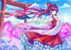  1girl bare_shoulders bow brown_eyes brown_hair cherry_blossoms clouds commentary_request day detached_sleeves forest frilled_skirt frills hair_bow hair_tubes hakurei_reimu highres long_hair looking_at_viewer looking_back mahou_kyuuri nature open_mouth outdoors petals photoshop_(medium) red_bow red_skirt revision shirt skirt sky solo strap torii touhou very_long_hair 