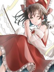  1girl ascot bow brown_eyes brown_hair commentary_request detached_sleeves frilled_bow frilled_hair_tubes frilled_skirt frills furawast gohei hair_bow hair_tubes hakurei_reimu highres holding holding_gohei long_hair looking_at_viewer one_eye_closed red_bow red_skirt skirt skirt_set solo touhou yellow_ascot 