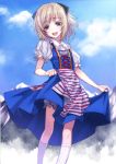  1girl :d blonde_hair bloomers blue_eyes clouds cross-laced_clothes dress highres looking_at_viewer matsuryuu mountain open_mouth original puffy_sleeves short_hair short_sleeves skirt_hold sky smile solo underwear white_legwear 