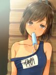  1girl bare_shoulders brown_eyes brown_hair bust character_name collarbone i-401_(kantai_collection) kanden_suki kantai_collection looking_at_viewer mouth_hold one-piece_swimsuit one-piece_tan ponytail popsicle school_swimsuit short_hair short_ponytail solo strap_slip swimsuit tan tanline 