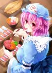  1girl blush eating ginzake_(mizuumi) hat japanese_clothes kimono looking_back pink_eyes pink_hair saigyouji_yuyuko sash short_hair solo sushi touhou 