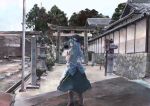  1girl blue_hair boots food fruit hat highres hinanawi_tenshi ichiba_youichi long_hair peach photo_reference puffy_short_sleeves puffy_sleeves real_world_location road sash shirt short_sleeves skirt solo street torii touhou town tree 