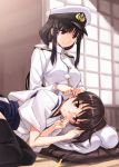  2girls black_hair blush brown_eyes brown_hair dougi ear_cleaning female_admiral_(kantai_collection) hat highres indoors japanese_clothes kaga_(kantai_collection) kantai_collection lap_pillow long_hair looking_at_another looking_down lying lying_on_person matsuryuu military military_uniform mimikaki mole multiple_girls naval_uniform peaked_cap seiza short_hair sitting uniform 