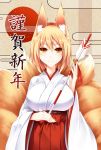  1girl animal_ears arrow blonde_hair breasts fox_ears fox_tail japanese_clothes large_breasts looking_at_viewer midori_(misuriru8) multiple_tails short_hair smile solo tail touhou translation_request wide_sleeves yakumo_ran yellow_eyes 