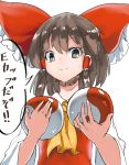  1girl ascot bow brown_eyes brown_hair frills hair_bow hair_tubes hakurei_reimu holding kinketsu long_sleeves looking_at_viewer nontraditional_miko red_bow short_hair smile solo touhou translation_request yin_yang 
