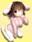  1girl :3 alternate_breast_size animal_ears blush bottomless breasts brown_hair cleavage ecou from_above inaba_tewi large_breasts looking_at_viewer open-chest_sweater rabbit_ears red_eyes short_hair simple_background sitting solo sweater sweater_tug thighhighs touhou turtleneck v wariza white_legwear wink yellow_background 