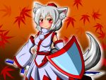  1girl animal_ears autumn_leaves blush breasts detached_sleeves hat highres inubashiri_momiji leaf leaf_background looking_at_viewer pom_pom_(clothes) red_eyes shield short_hair silver_hair smile solo sword tail tokin_hat touhou weapon wolf_ears wolf_tail 