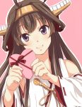  1girl ahoge brown_hair chocolate chocolate_heart detached_sleeves hairband headgear heart kantai_collection kongou_(kantai_collection) long_hair looking_at_viewer pink_background pre3445 simple_background smile solo valentine violet_eyes 